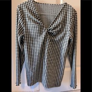 Black and white checkered top. Size small. Gently used